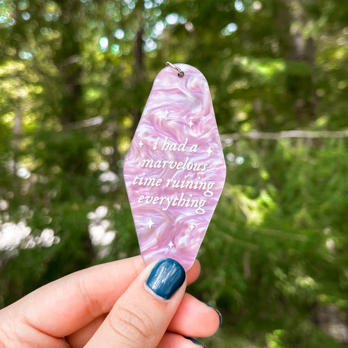 Aesthetic marble acrylic keychain with the lyrics "i had a marvelous time ruining everything" inspired by Taylor Swift's Folklore song "The Last Great American Dynasty". 
