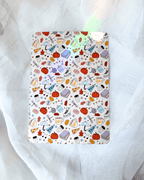 kindle insert with a patterned collage of random illustrations inspired by gilmore girls.