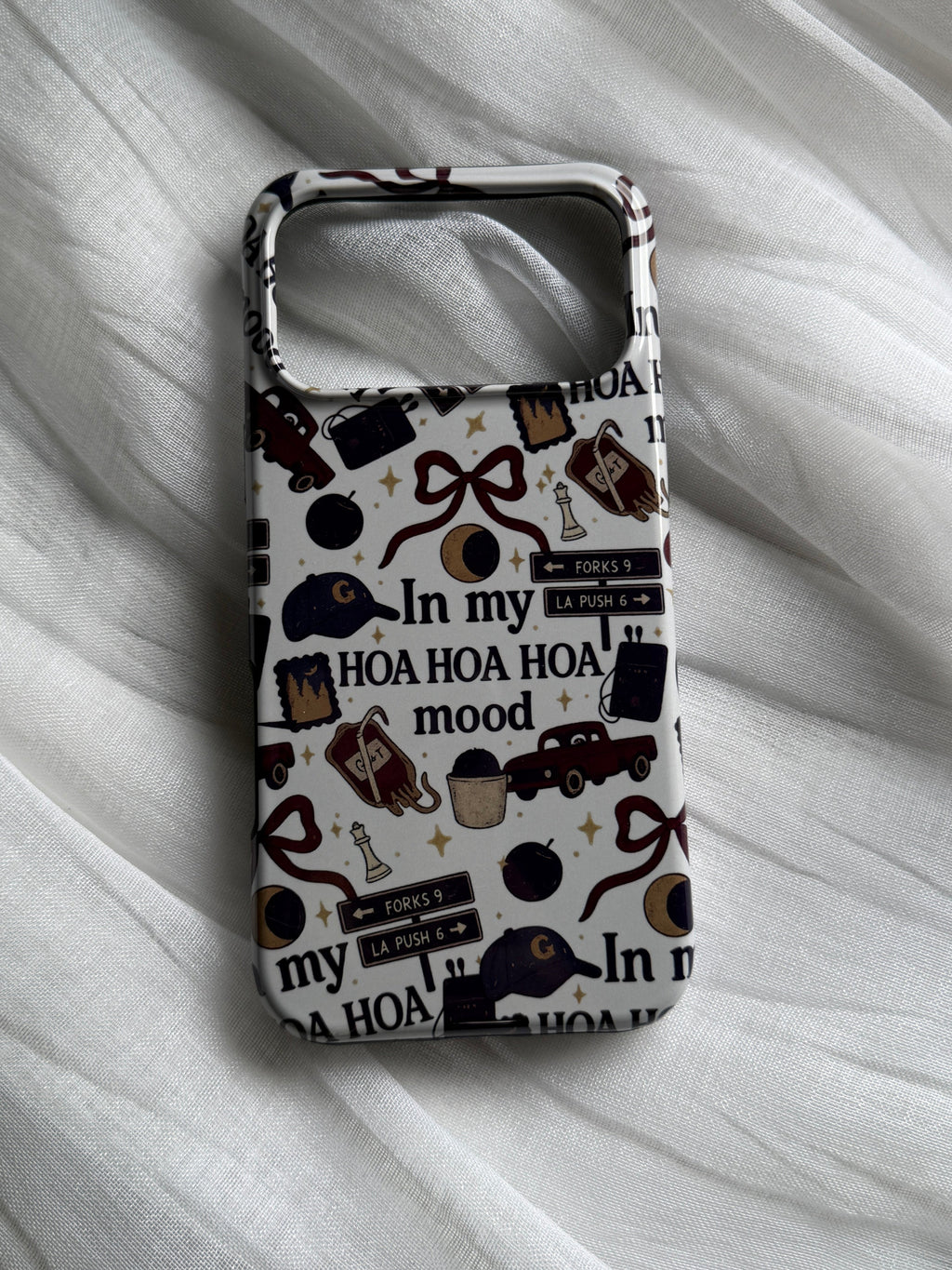 A phone case featuring a collage of various Twilight-inspired designs, with the text "In my hoa hoa hoa mood?"