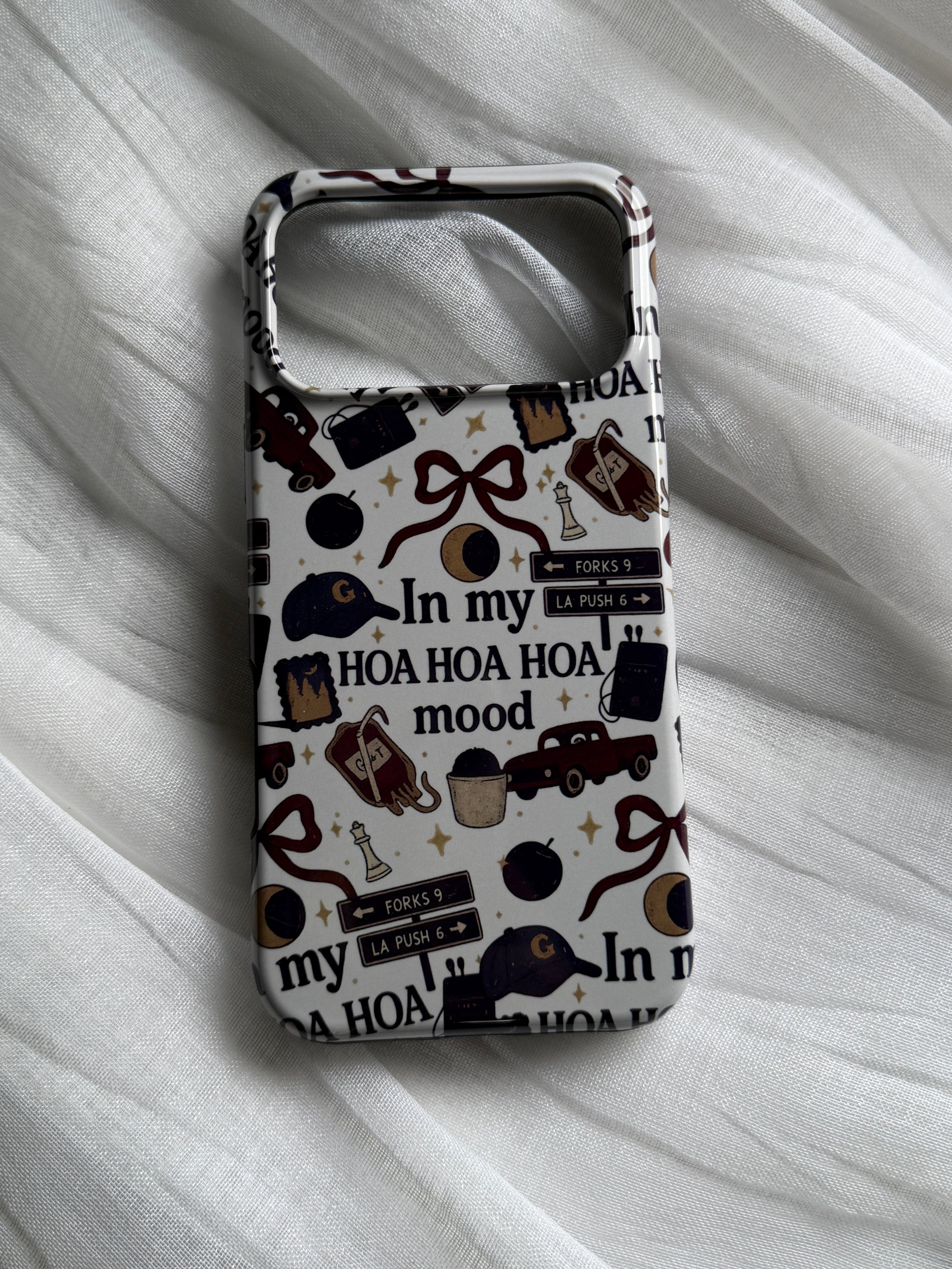 A phone case featuring a collage of various Twilight-inspired designs, with the text "In my hoa hoa hoa mood?"