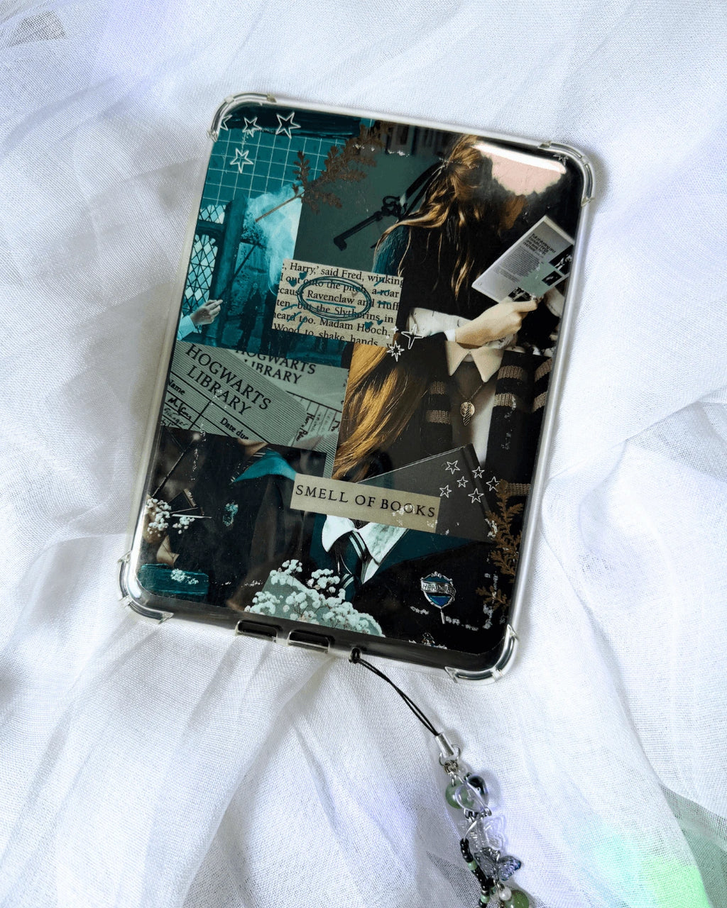 A kindle insert with a harry potter ravenclaw inspired collage.
