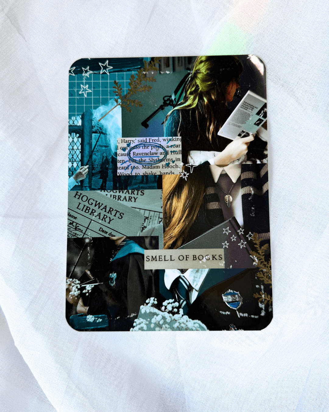 A kindle insert with a harry potter ravenclaw inspired collage.