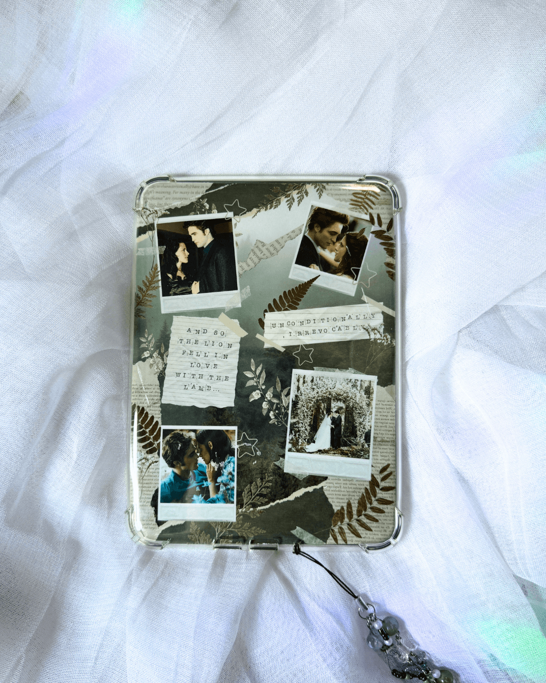 A kindle insert featuring a collage of twilight photos, plant, quotes, etc.