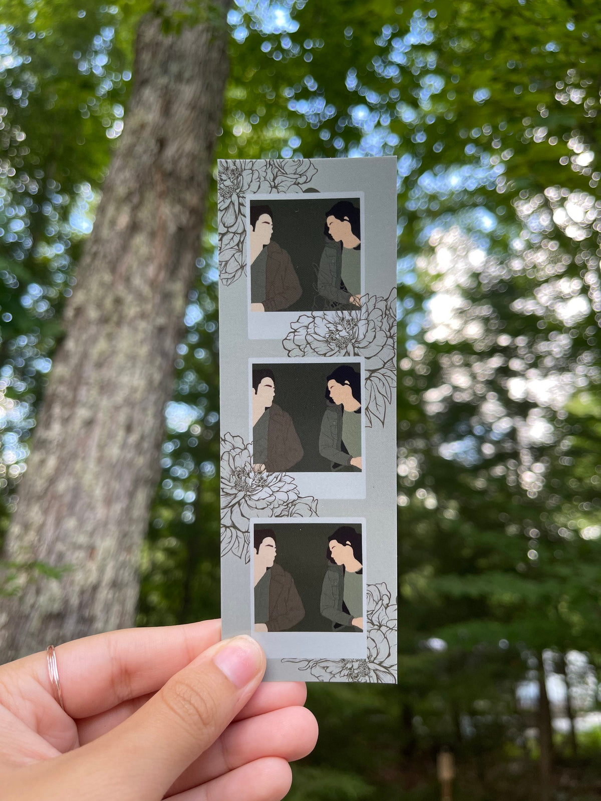 Twilight-inspired bookmark with an illustrated polaroid design.