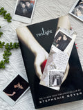 A laminated bookmark inspired by the wedding of bella and edward from the twilight saga.